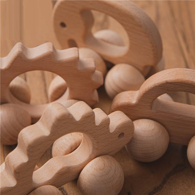Jouets de dentition stylisés en bois avec roulettes 