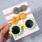 Kit lunettes de soleil colorées + chouchou assorti Fleur verte