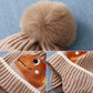 Bonnet d'hiver dinosaure pour bébé avec protection des oreilles et pompon
